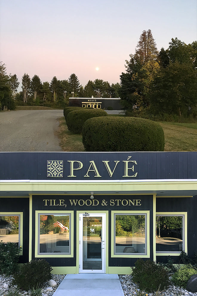 An showroom of in-stock antique French limestone and French oak floors in Western MA.