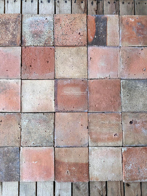 Flash marks are tell tale signs that the Reclaimed French terra cotta tiles were fired in wood-burning kilns.