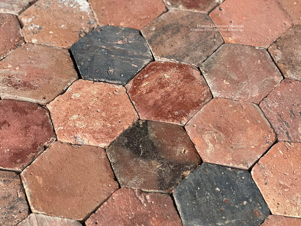 The hand made craftmanship of our 150 -year old antique French terra cotta tile creates love affairs with your kitchen floor.