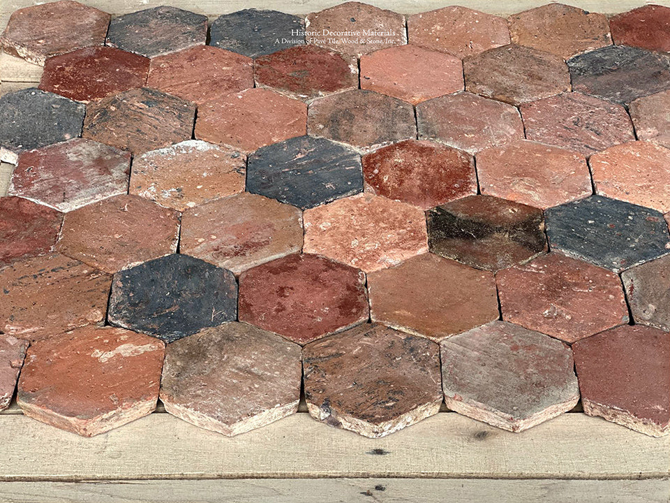 Breathtaking color variation in charcoal, clay and greige makes this antique French terra cotta tile fabulous for an entryway or kitchen floor.