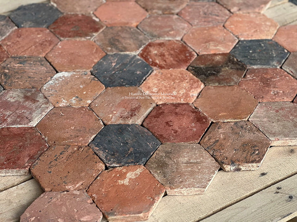 The glorious patina of an antique French terra cotta tile kitchen floor beckons you to walk barefoot into your kitchen.