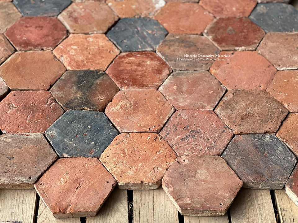 The color variations of French reclaimed terra cotta tiles make creativity soar!  A charcoal and blush color palette for the kitchen is calling.