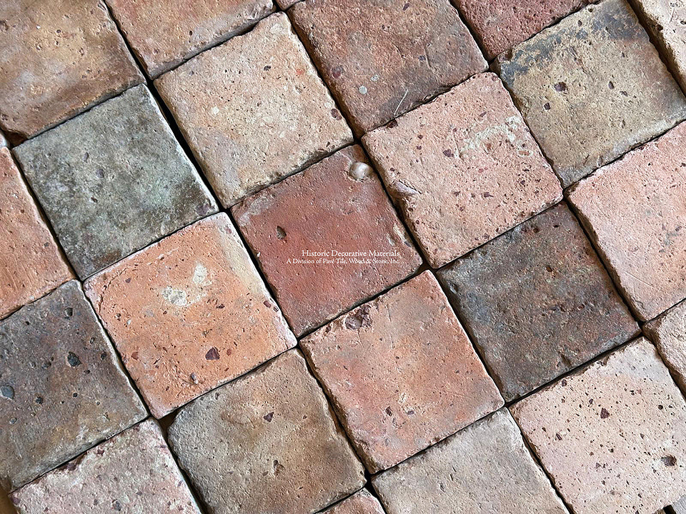 French reclaimed terra cotta tile cobblestones are loved for their petit size.