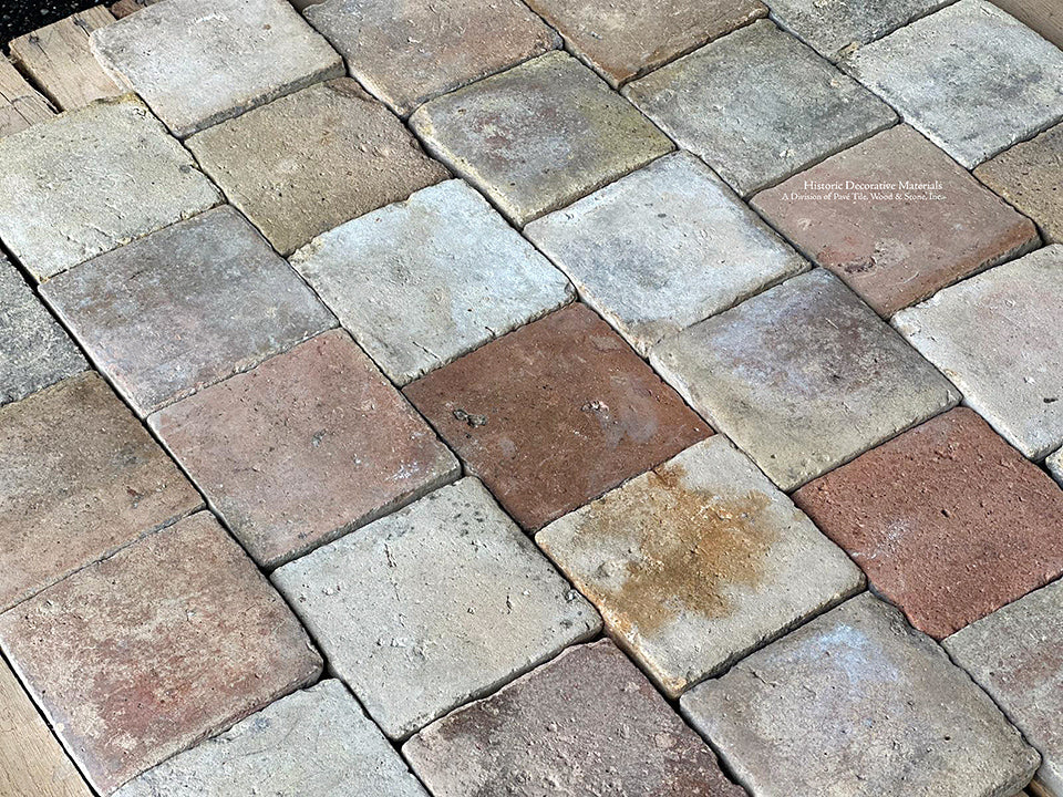 The beautiful color variations of French reclaimed terra cotta tile cobblestone are perfect for country French interior floors.