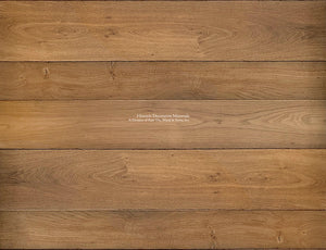 Wide-plank antiqued French oak floors in Vintage Chestnut color anchors handsomely historic restorations.