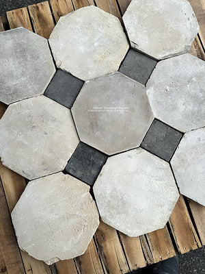 Antique Parisian French Grey Limestone Octagon + Antique Gray Terra Cotta Tile Cabochon decorates powder room floors.