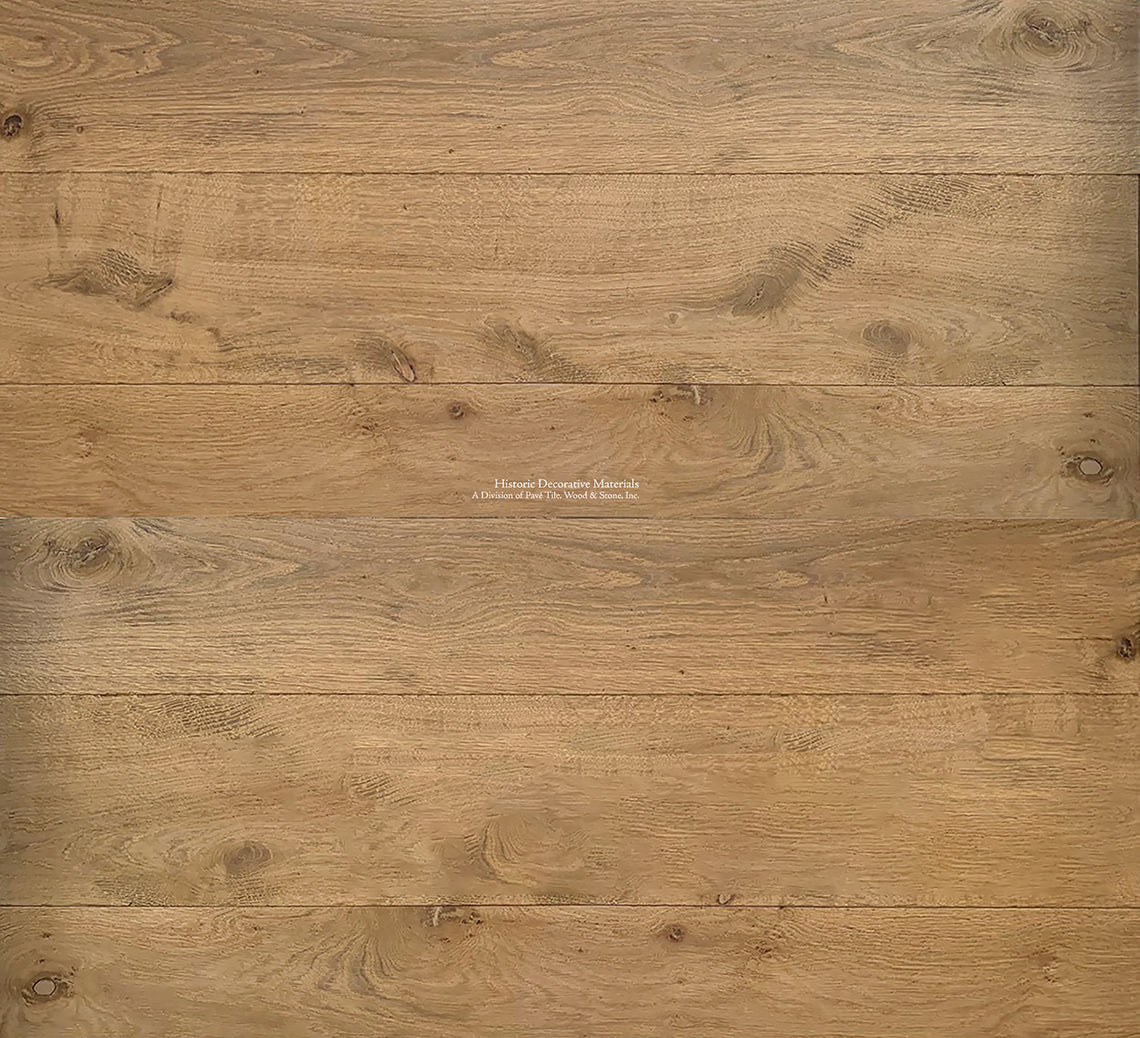 Custom stair treads of our antiqued French oak floors complete an interior.