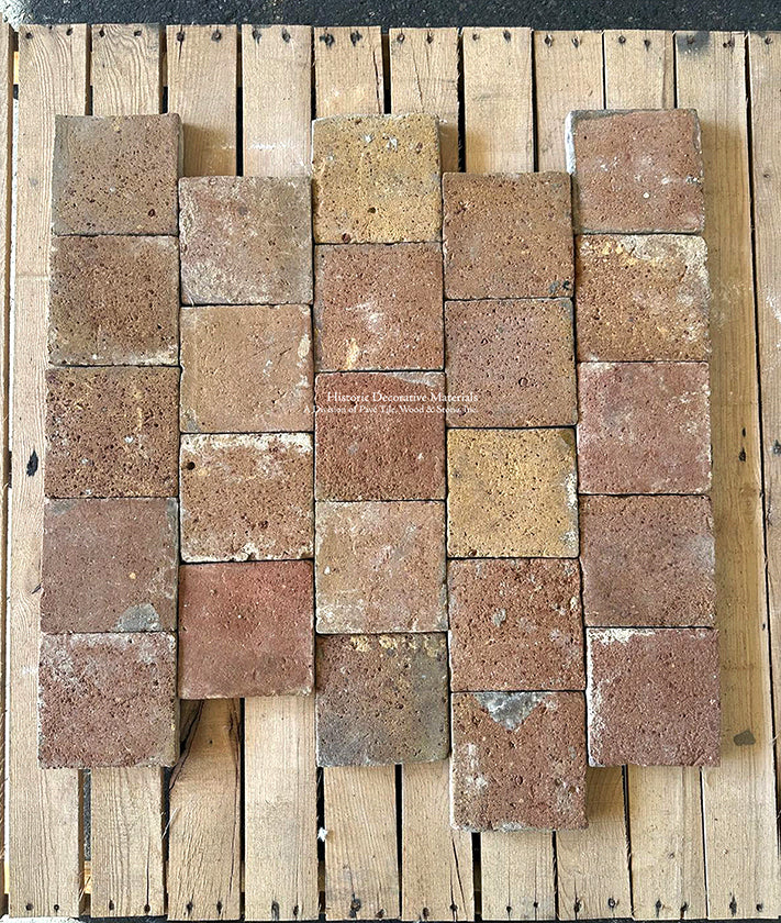 Install French reclaimed terra cotta square tiles on an off-set joint pattern for authenticity. 