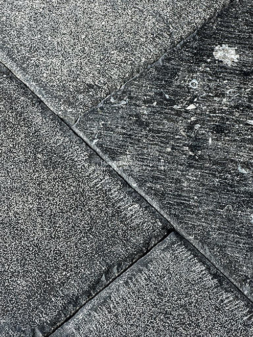Hand-chiseled edge details and tight grout lines are hallmarks of our Antiqued Belgian Bluestone Floors.