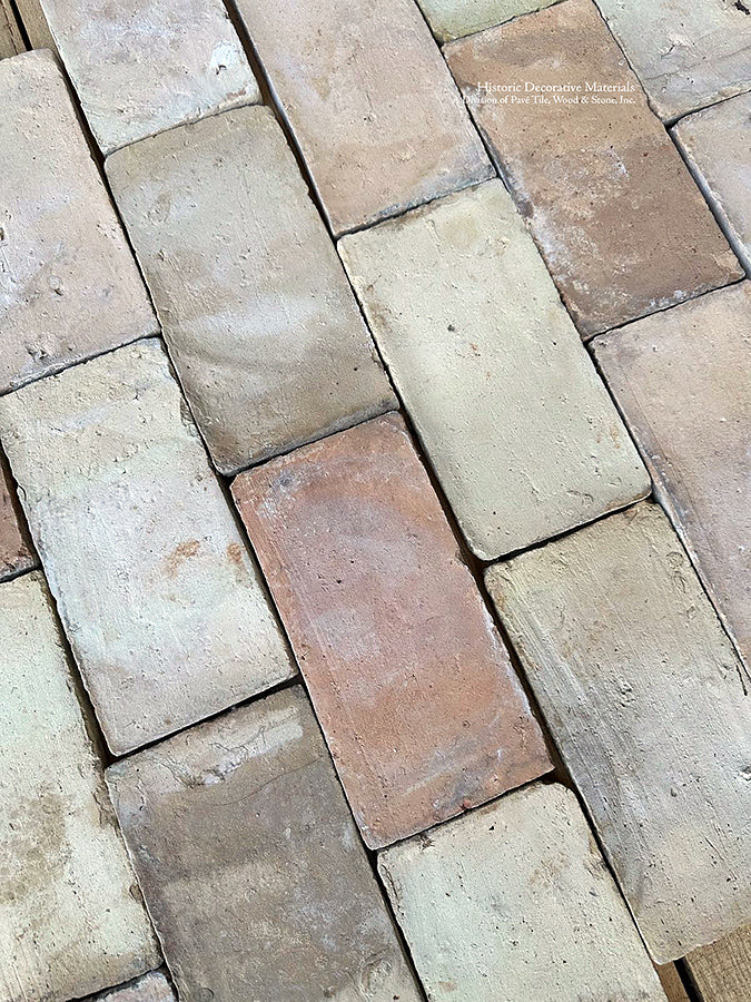 Originally used in Provençal ceilings, salvaging French reclaimed terra cotta parefeuille is now installed for kitchen floors.
