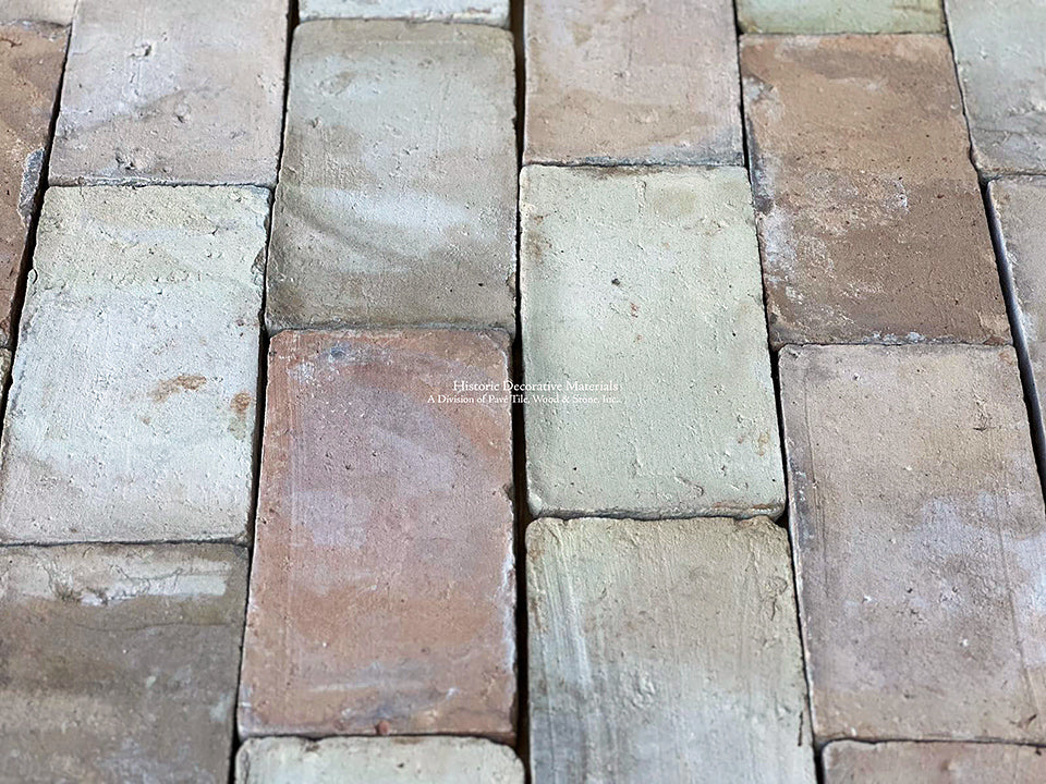 Walking barefoot on hand made reclaimed French terra cotta tile is one of the joys living with this material.