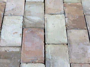Walking barefoot on hand made reclaimed French terra cotta tile is one of the joys living with this material.