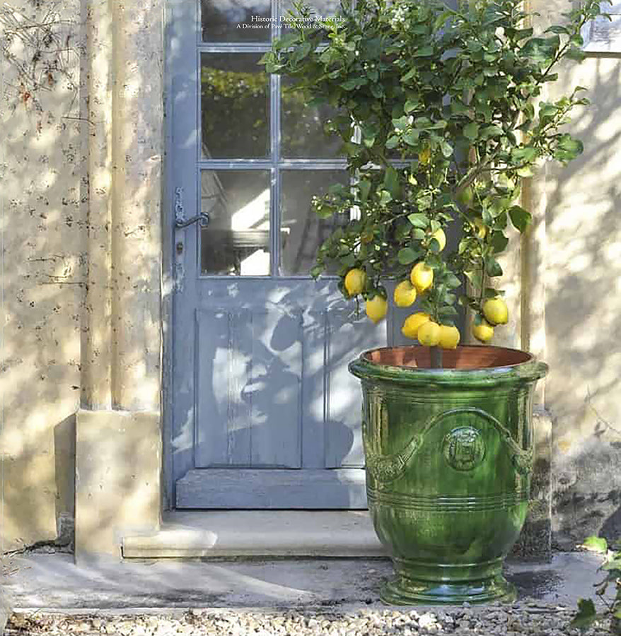 Antique French pottery for home decor reaches a pinnacle with this lemon tree housed in a French pottery from Provence.