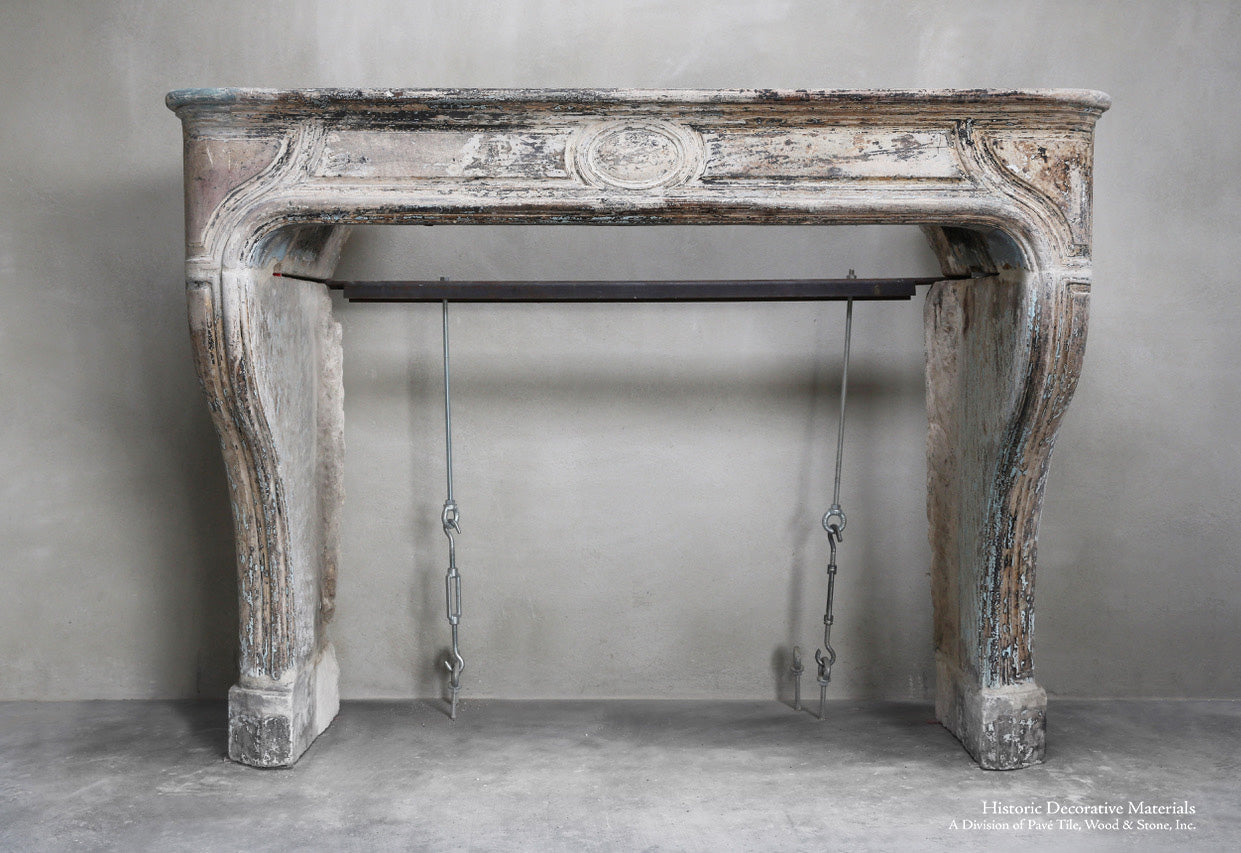 18th Century Louis XIV French Limestone Fireplace Mantel