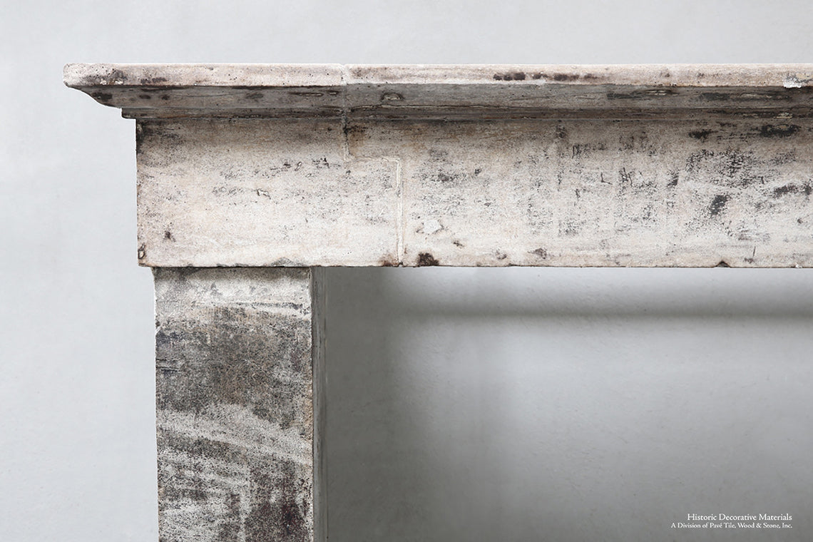 19th Century French Bourgogne Limestone Campagnarde Style Fireplace Mantel