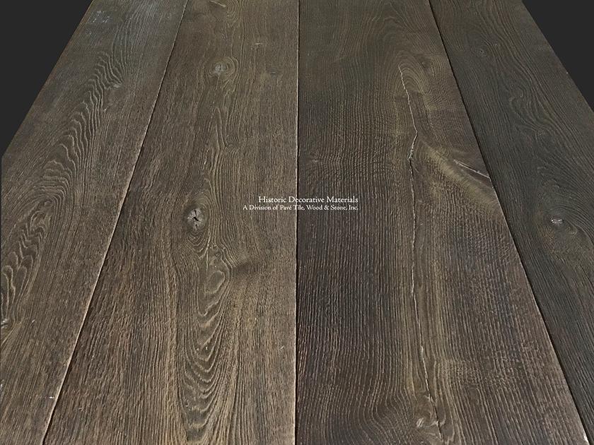 Rich olde walnut hues in our reclaimed French oak flooring is achieved through a 7-10 step oxidation process.