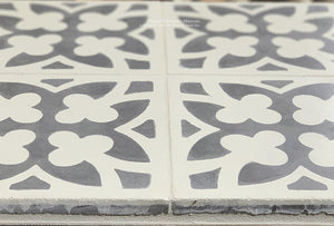 Antiqued by hand to accelerate the surface of the cement tile into a satin patina
