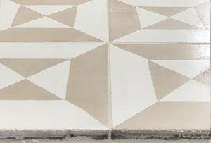 Antiqued by hand to accelerate the surface of the cement tile into a satin patina