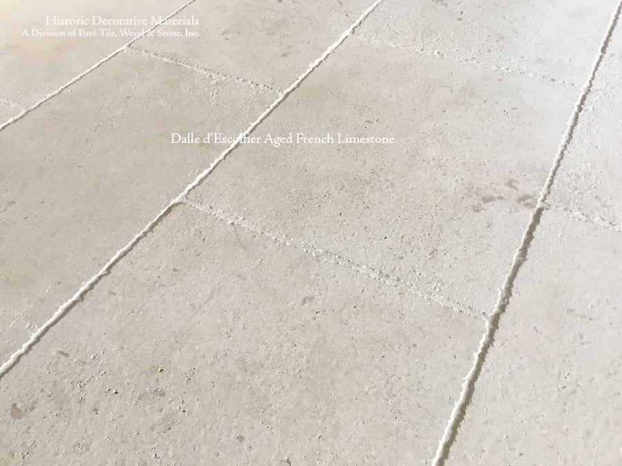 Antique white color palette is timeless installing antique French limestone floors.