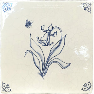 Hand-painted flowers are motifs on antique Delft tiles.