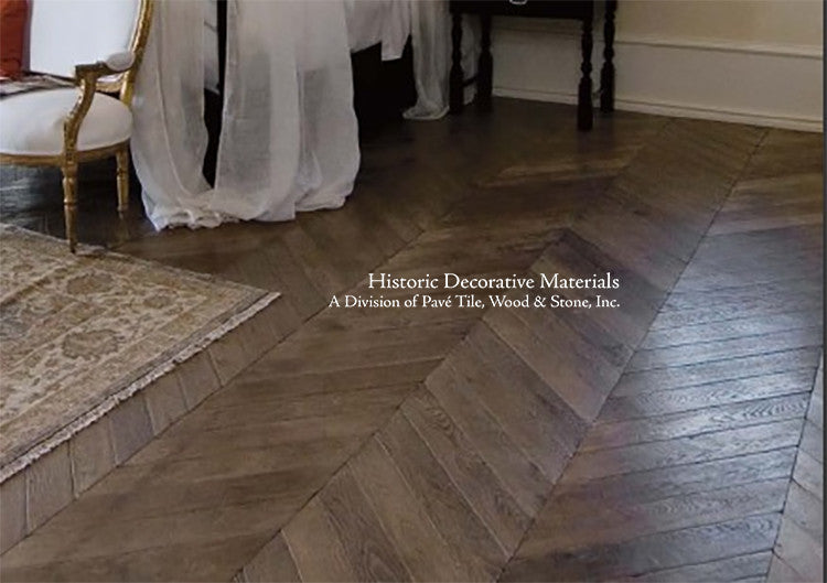 Antique rugs augment the beauty and history of our aged French oak flooring.