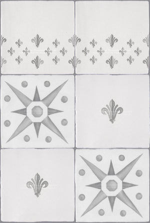 Feature tiles of vintage French fleurs-de-lys and encaustic star motifs create elegant kitchen interiors.