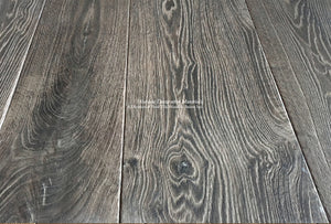 Reclaimed French oak floors with hand-finished charcoal and oak patina enriches historic interiors.